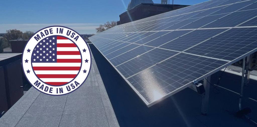 Made in USA badge over a rooftop solar array