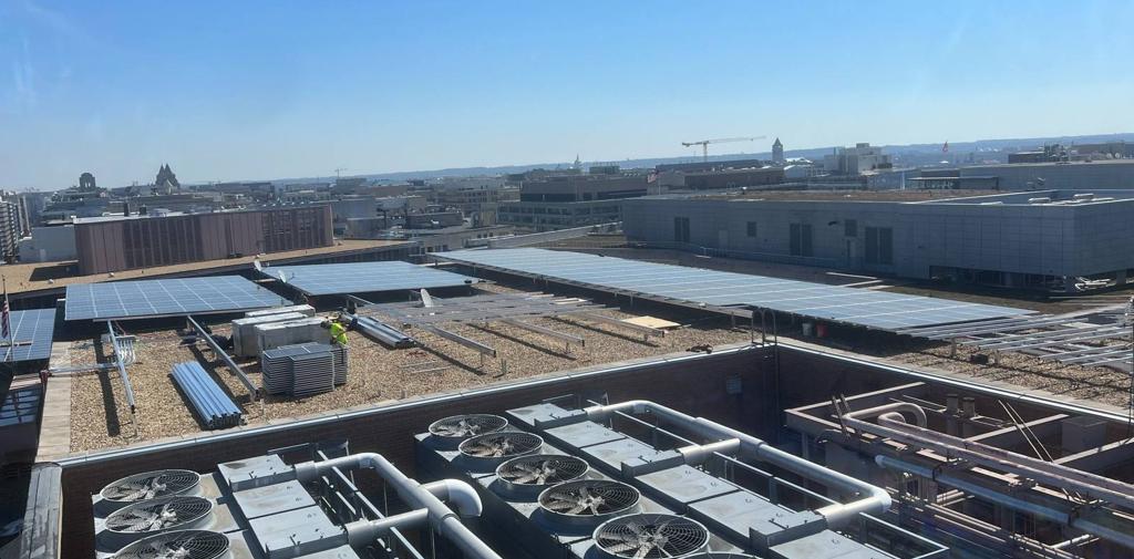 Flush Mount solar arrays beside rooftop cooling towers