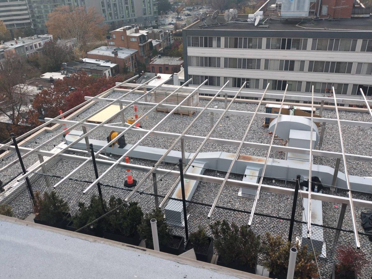 Racking frame over rooftop ducts at 925, before the panels