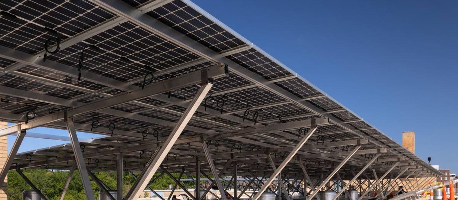 Elevated rooftop solar canopy