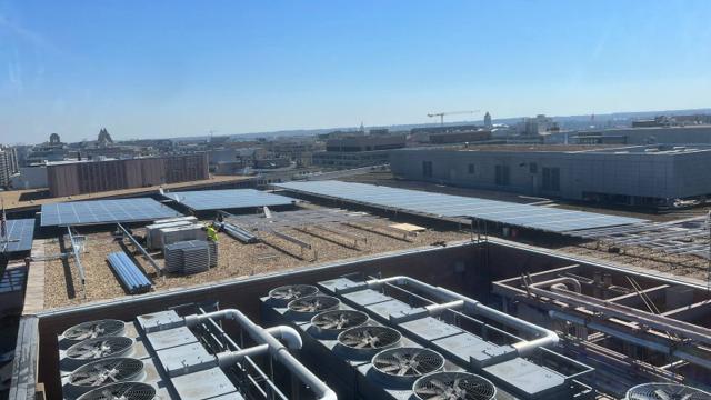 Flush Mount solar arrays beside rooftop cooling towers