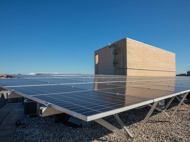 Elevated solar canopy beside the penthouse on the roof of 1441 Rhode Island Ave.