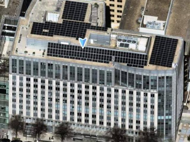 Aerial view of the building at 1909 Aurora Energy with rooftop solar