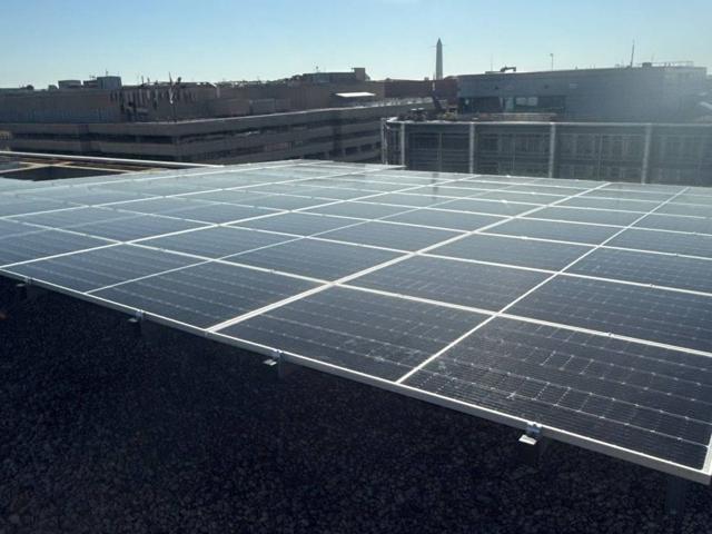 Solar array on the roof of 1909 Aurora Energy