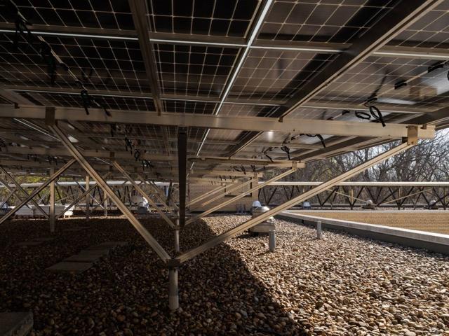 Aluminum posts and bracing beneath the solar canopy at 3801 Connecticut Ave.