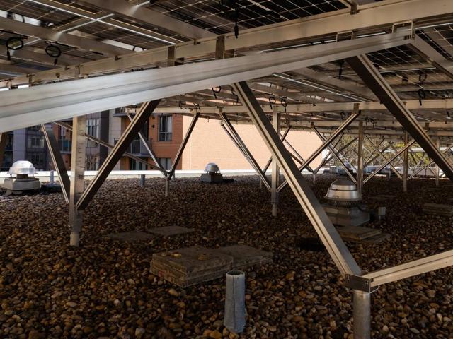 Racking structure beneath the solar canopy over the gravel roof at 3801 Connecticut Ave.