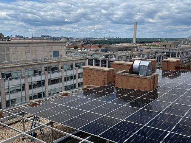 Solar canopy under construction on the roof at 616
