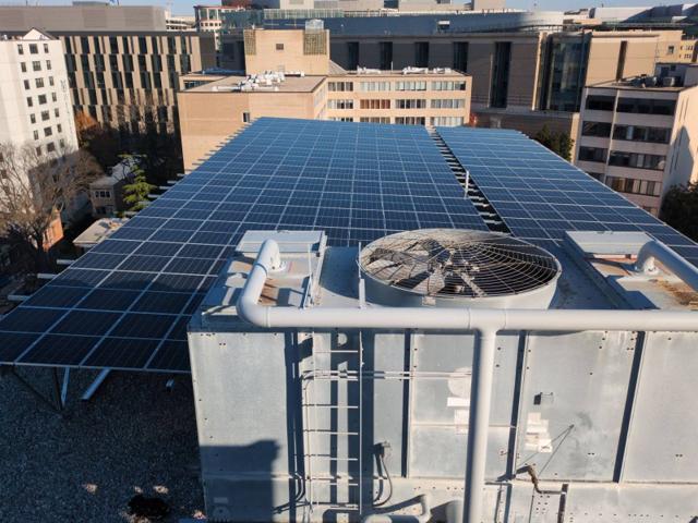 Solar canopy behind the rooftop cooling tower at 925