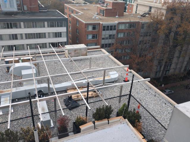Racking frame over rooftop ductwork at 925 during installation