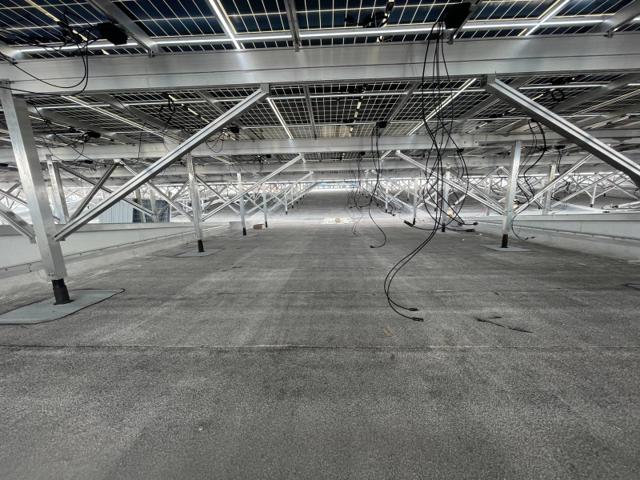Open space beneath an Elevated Flush Mount solar canopy