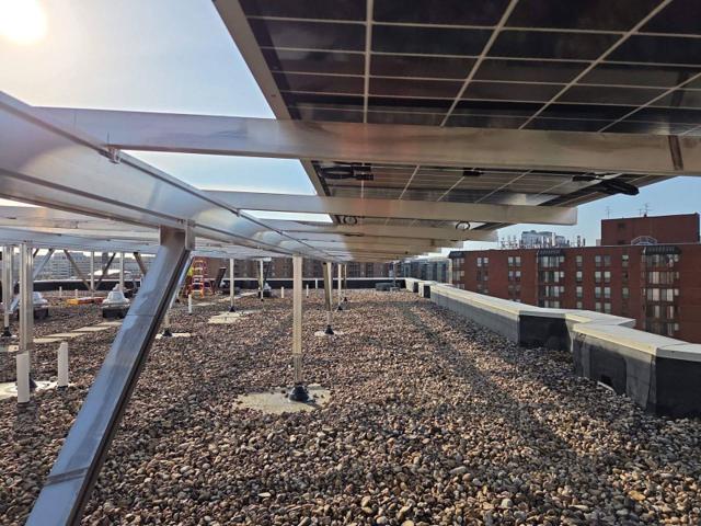 Beneath the solar canopy along the parapet at GRP