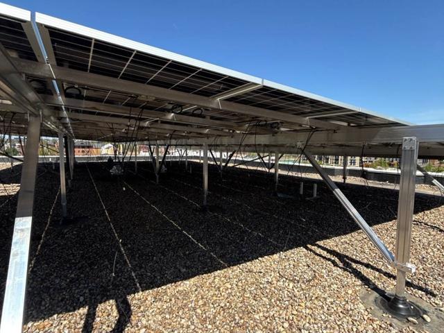 Solar canopy supports on the gravel roof at GRP