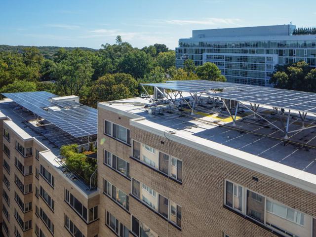 Aerial view of solar canopies on the roof of the Kenmore apartment building