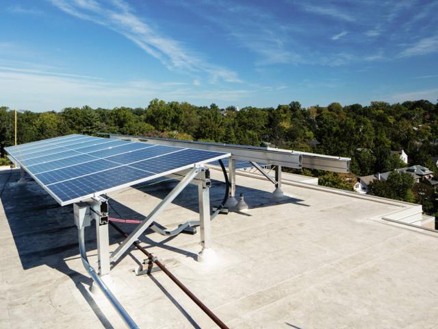 Small elevated solar canopy on the roof of Kenmore
