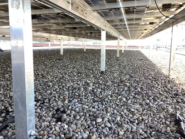 Aluminum posts beneath the elevated flush mount array at Lafayette