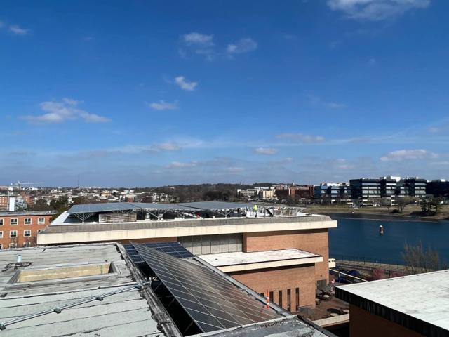 Roof of Locke Hall with its solar array and the river beyond