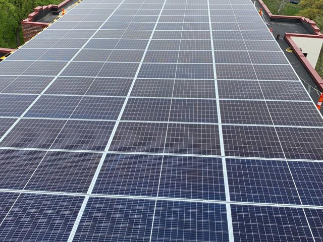 Aerial view of the solar canopy covering the roof of Randolph Towers