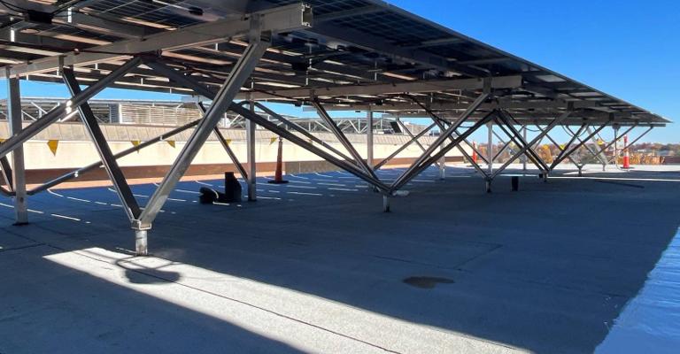 Elevated W System solar canopy above the roof at Locke Hall