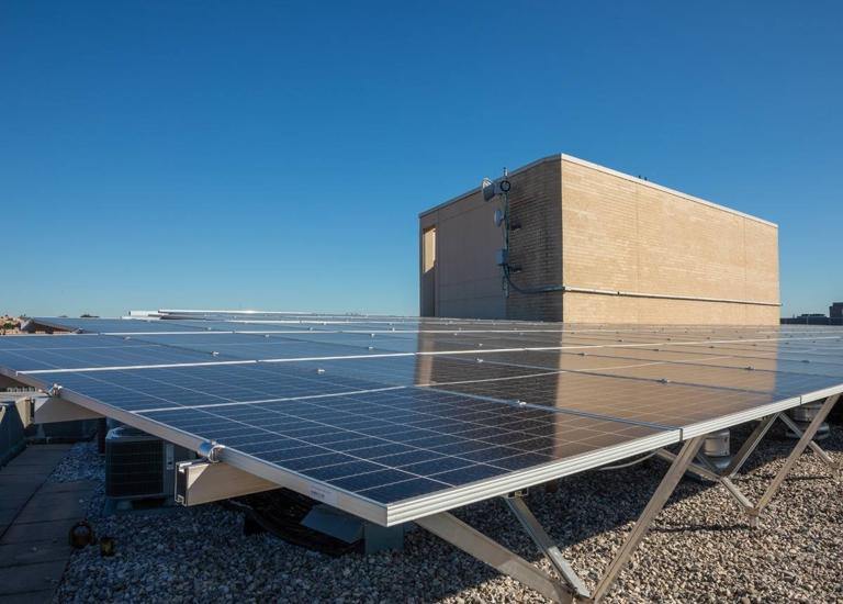 Elevated solar canopy beside the penthouse on the roof of 1441 Rhode Island Ave.