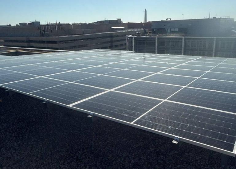 Solar array on the roof of 1909 Aurora Energy