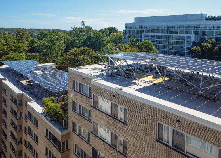 Aerial view of solar canopies on the roof of the Kenmore apartment building