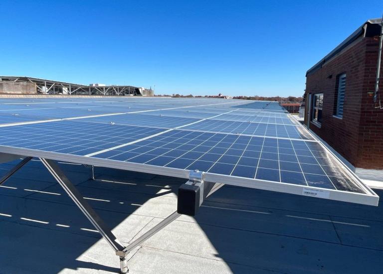 Edge of the solar canopy over the newly replaced roof at Locke Hall