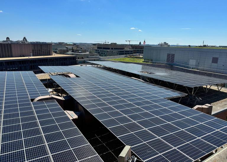 Solar canopy sections stepping across the roof of Washington Square