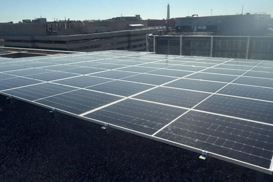 Solar array on the roof of 1909 Aurora Energy